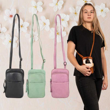 compact-firearm-ccw-crossbody-purse-shay-on model-showing-pepper-spray-ccw-compartment